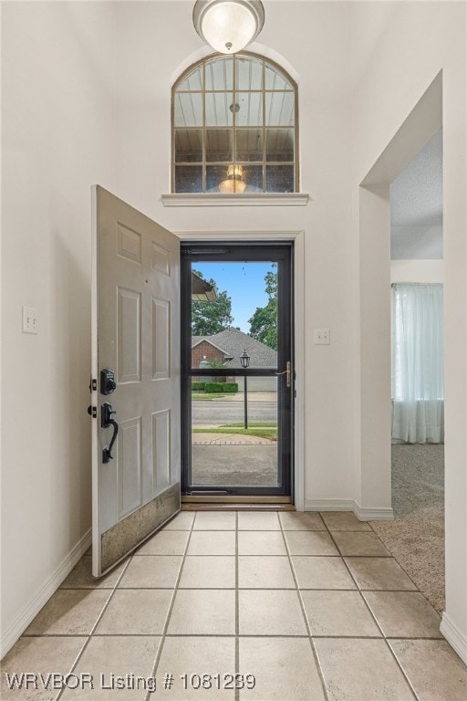 330 Northridge Dr, Van Buren, AR 72956 - entryway with light tile patterned floors and baseboards