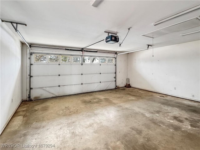 parking deck featuring a garage door opener