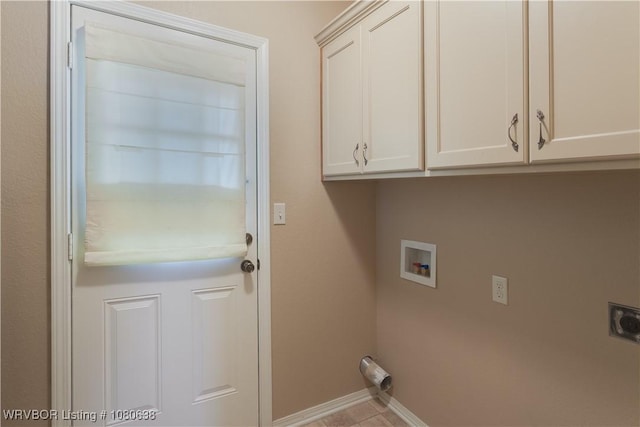 laundry room with cabinet space, washer hookup, tile patterned floors, baseboards, and hookup for an electric dryer