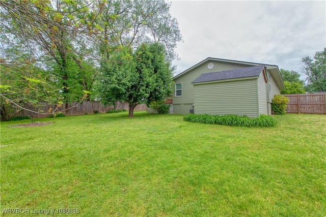 view of yard with fence