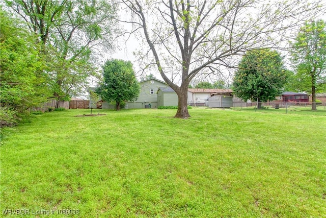view of yard with fence