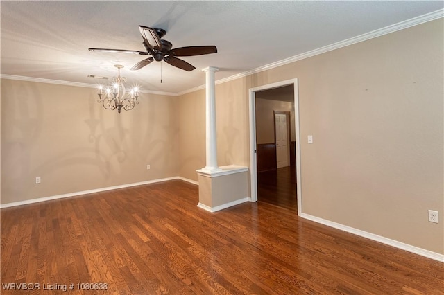 spare room featuring baseboards, ornamental molding, ceiling fan with notable chandelier, and wood finished floors