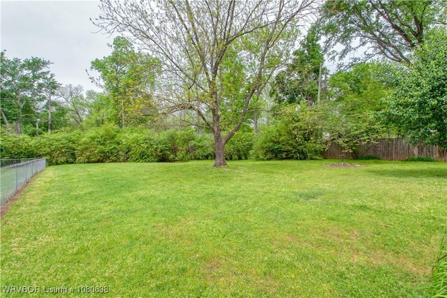 view of yard with fence