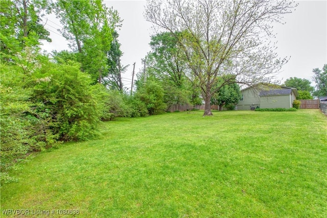 view of yard featuring fence