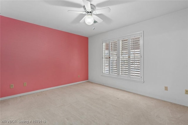 10408 Tweed Ln, Fort Smith, AR 72908 - spare room featuring light carpet, ceiling fan, and baseboards