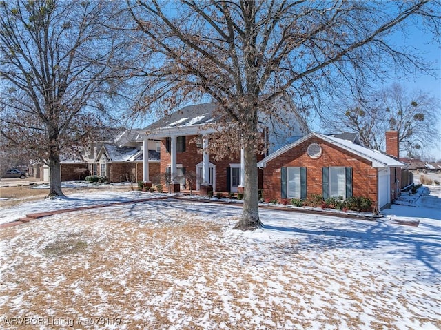 10408 Tweed Ln, Fort Smith, AR 72908 - neoclassical home with a chimney and brick siding