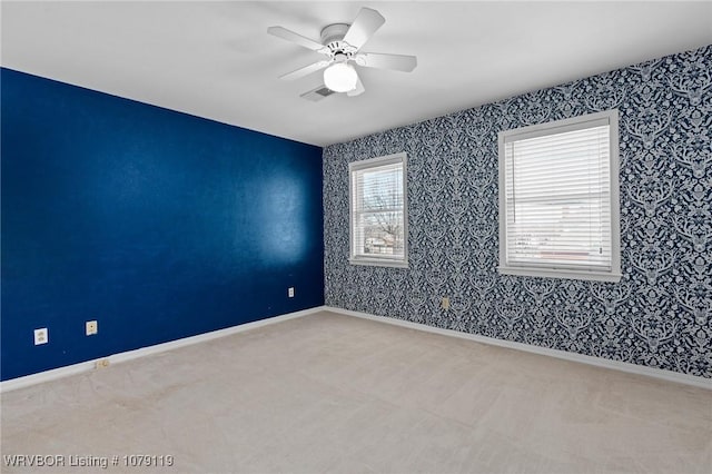 10408 Tweed Ln, Fort Smith, AR 72908 - unfurnished room featuring baseboards, ceiling fan, visible vents, and wallpapered walls