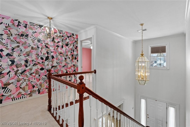 10408 Tweed Ln, Fort Smith, AR 72908 - corridor with carpet floors, crown molding, a notable chandelier, visible vents, and an upstairs landing