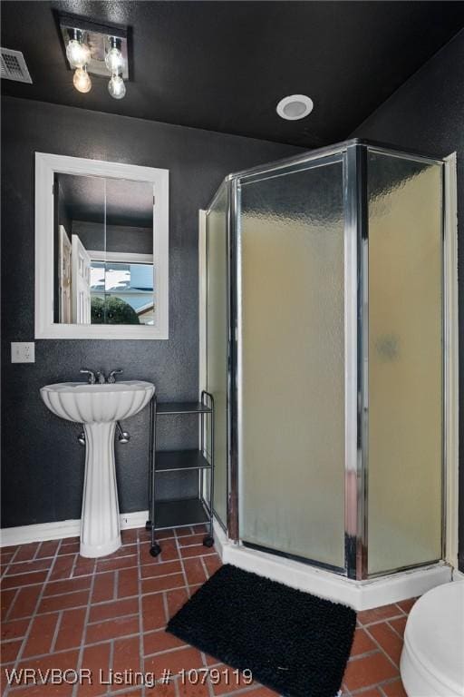 10408 Tweed Ln, Fort Smith, AR 72908 - bathroom featuring toilet, a shower stall, visible vents, and tile patterned flooring