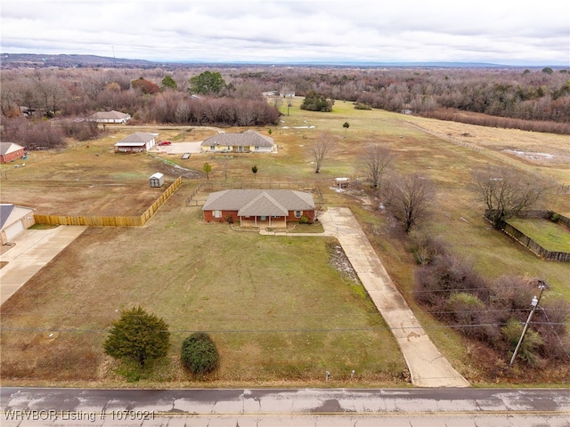 birds eye view of property featuring a rural view