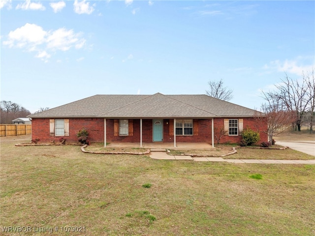 ranch-style house with a front yard