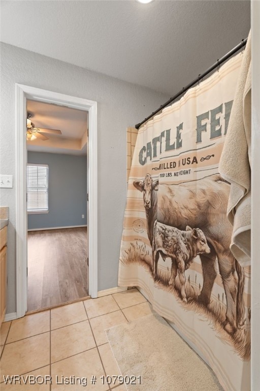 room details featuring a textured ceiling and ceiling fan