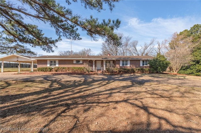 ranch-style home with brick siding