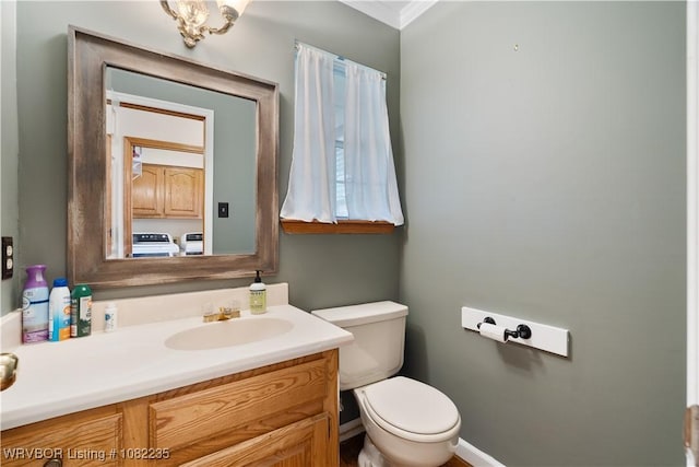 3017 Canongate Way, Fort Smith, AR 72908 - bathroom featuring vanity, crown molding, and washer and clothes dryer
