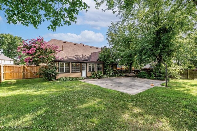 3017 Canongate Way, Fort Smith, AR 72908 - back of house with a patio area, a fenced backyard, and a shingled roof