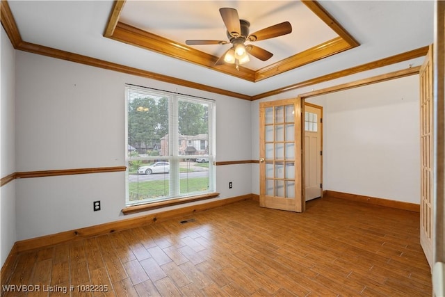 3017 Canongate Way, Fort Smith, AR 72908 - unfurnished room with a tray ceiling, ornamental molding, wood finished floors, and ceiling fan