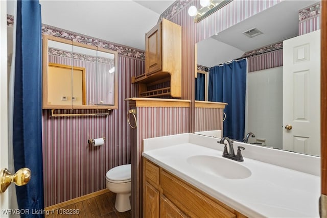3017 Canongate Way, Fort Smith, AR 72908 - full bath with wood finished floors, vanity, curtained shower, and wallpapered walls