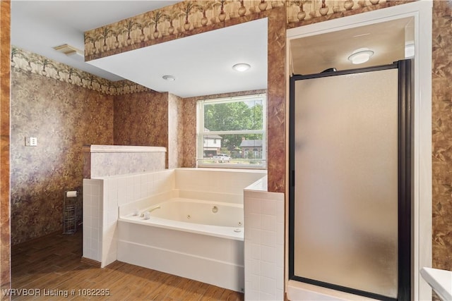 3017 Canongate Way, Fort Smith, AR 72908 - bathroom featuring a whirlpool tub, a stall shower, and wood finished floors