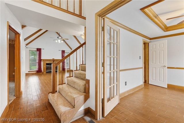 3017 Canongate Way, Fort Smith, AR 72908 - stairway with ceiling fan, wood finished floors, and a fireplace