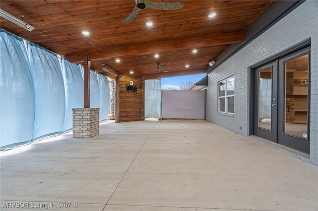 view of patio with ceiling fan and french doors
