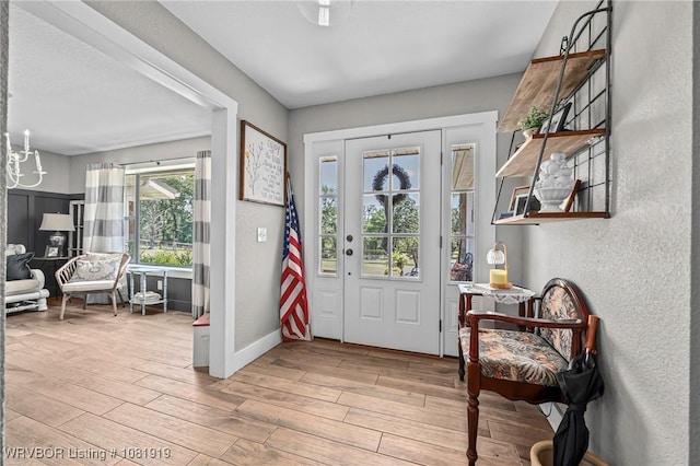 8807 Cain Rd, Alma, AR 72921 - foyer with wood finished floors and a textured wall