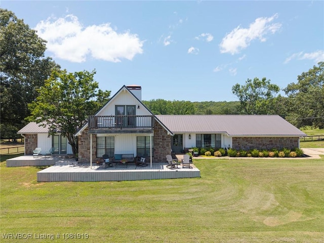 8807 Cain Rd, Alma, AR 72921 - back of house with a balcony, a yard, and a deck