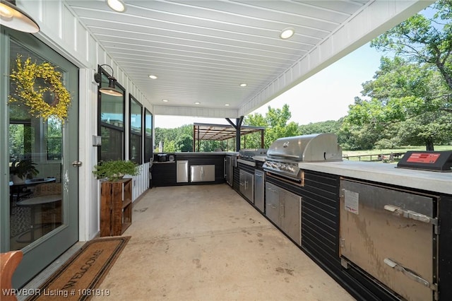 8807 Cain Rd, Alma, AR 72921 - view of patio with exterior kitchen and a carport