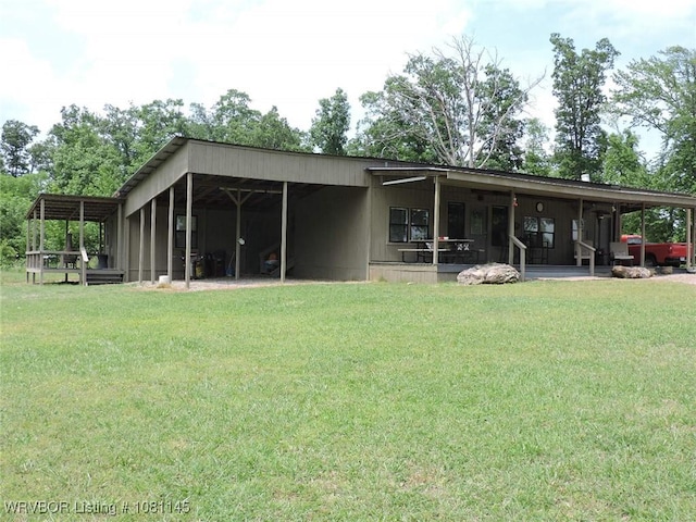 19108 Canova Trl, Mountainburg, AR 72946 - back of property featuring a yard