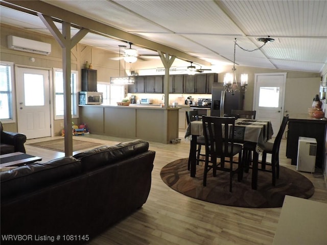 19108 Canova Trl, Mountainburg, AR 72946 - living room featuring a wall mounted AC, light wood-type flooring, a chandelier, a ceiling fan, and beamed ceiling