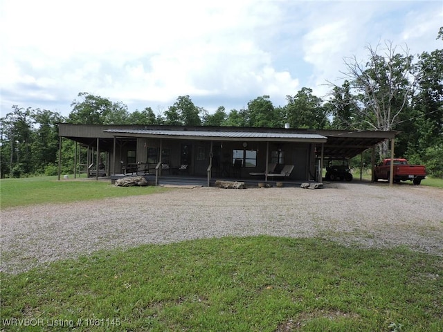 19108 Canova Trl, Mountainburg, AR 72946 - farmhouse-style home with a front yard and driveway