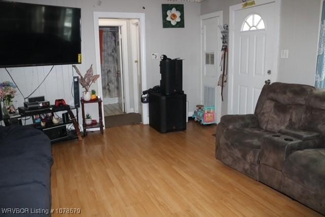 living room with wood finished floors