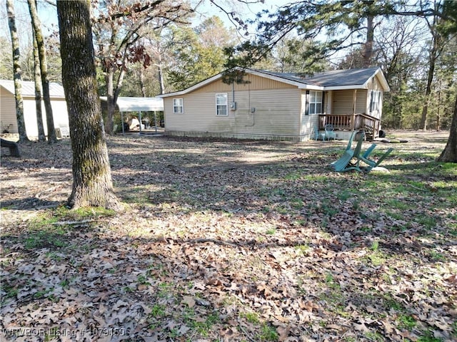 exterior space with gravel driveway