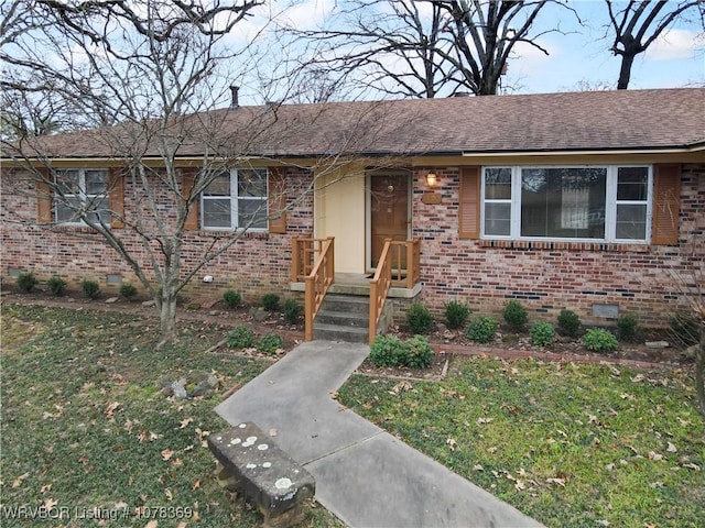 ranch-style home with a front yard