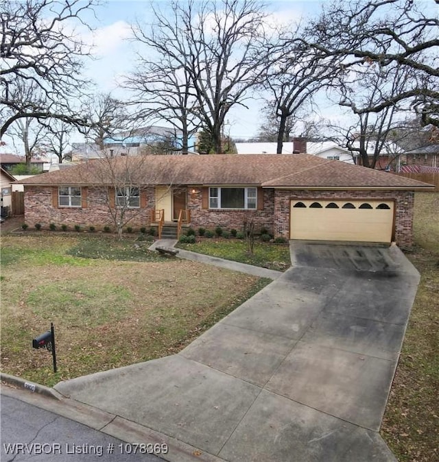 ranch-style house with a front lawn and a garage