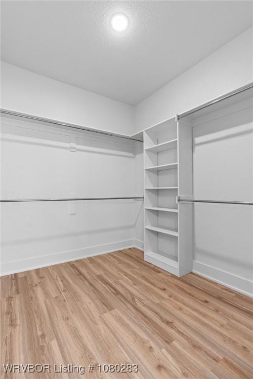 1900 Yellowstone Dr, Barling, AR 72923 - spacious closet with light wood-style floors