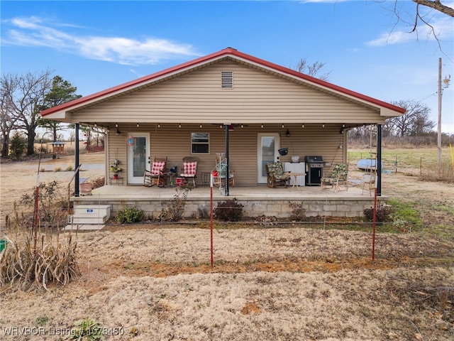 rear view of property with a patio