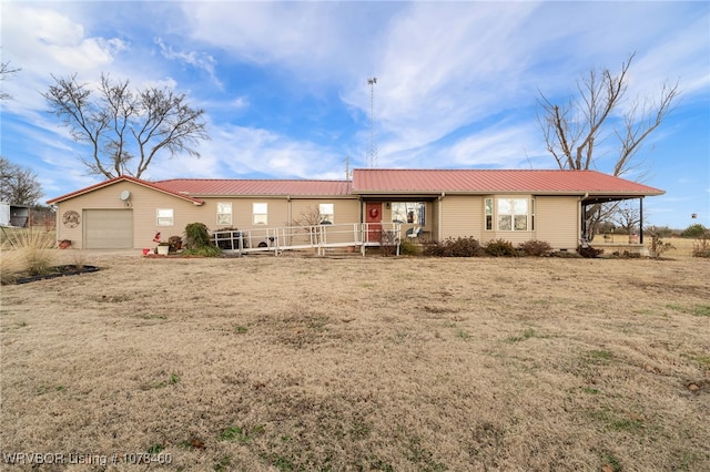 ranch-style home with a garage, a front yard, and a porch