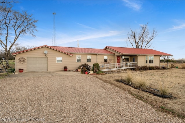 single story home with a garage