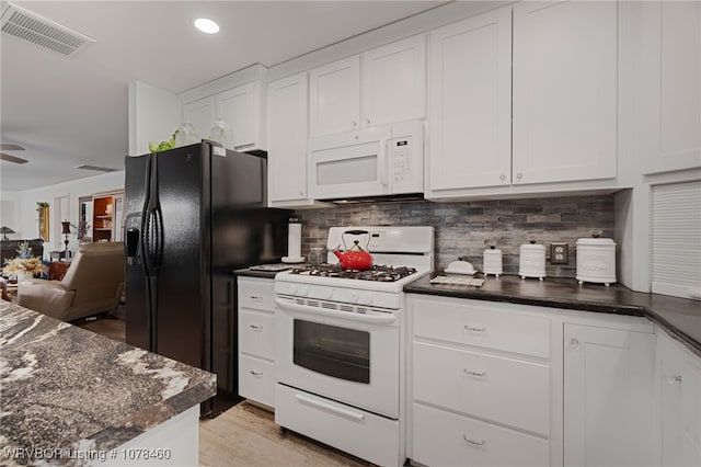 kitchen featuring white cabinetry, ceiling fan, tasteful backsplash, white appliances, and light wood-type flooring