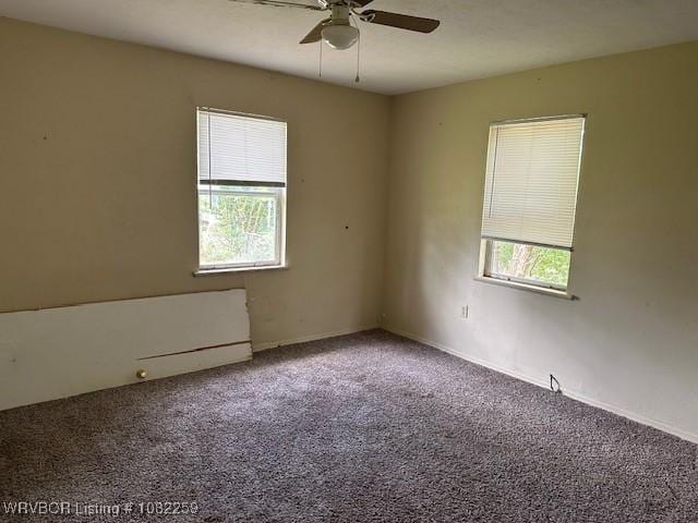505 Pine St, Van Buren, AR 72956 - unfurnished room featuring ceiling fan and carpet floors
