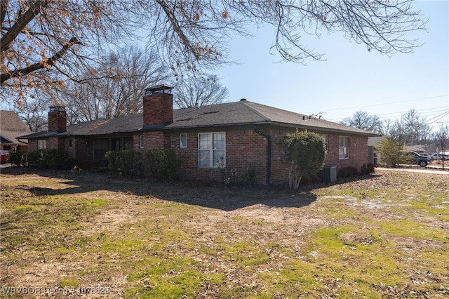 view of property exterior with a yard