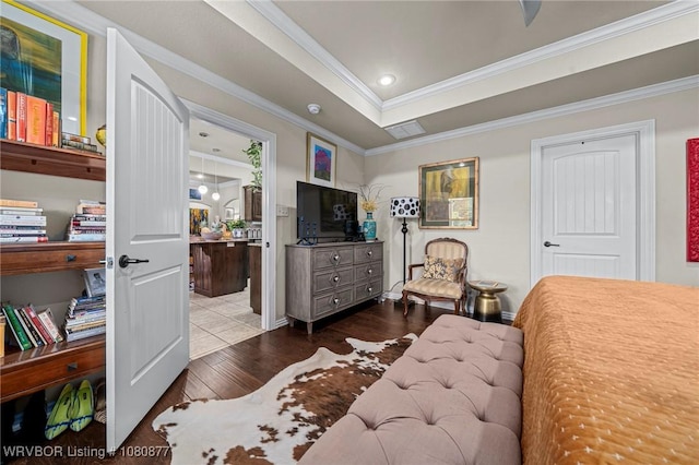 9019 Gracie Ln, Fort Smith, AR 72916 - bedroom featuring wood-type flooring, crown molding, a tray ceiling, and baseboards