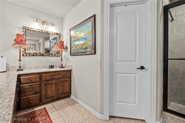 9019 Gracie Ln, Fort Smith, AR 72916 - full bathroom featuring tile patterned flooring, vanity, tiled shower, and baseboards