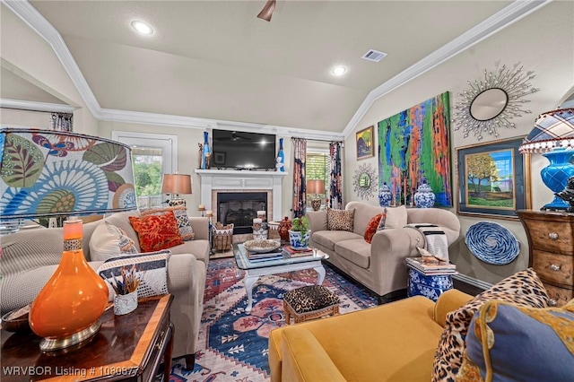 9019 Gracie Ln, Fort Smith, AR 72916 - living area with lofted ceiling, ornamental molding, a glass covered fireplace, and recessed lighting