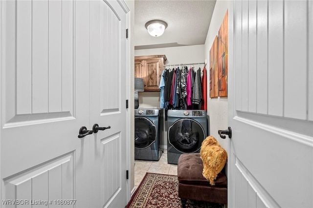 9019 Gracie Ln, Fort Smith, AR 72916 - washroom with independent washer and dryer, cabinet space, tile patterned flooring, and a textured ceiling