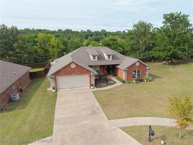 9019 Gracie Ln, Fort Smith, AR 72916 - traditional home with brick siding, driveway, an attached garage, a front lawn, and roof with shingles