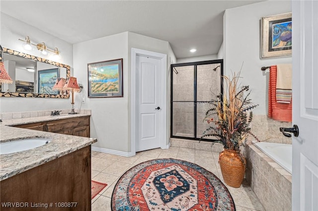 9019 Gracie Ln, Fort Smith, AR 72916 - full bathroom featuring vanity, a shower stall, tile patterned floors, a bath, and baseboards