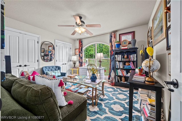9019 Gracie Ln, Fort Smith, AR 72916 - living room with a ceiling fan and a textured ceiling