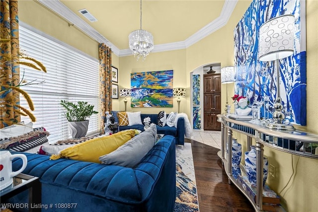 9019 Gracie Ln, Fort Smith, AR 72916 - living area featuring crown molding, a chandelier, and wood finished floors