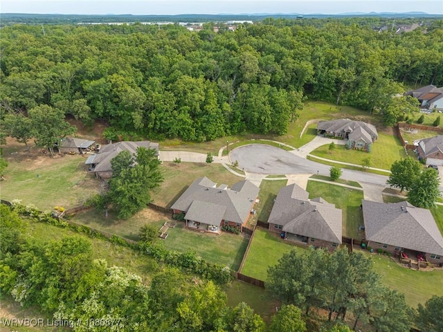 9019 Gracie Ln, Fort Smith, AR 72916 - aerial overview of property's location with nearby suburban area and a heavily wooded area